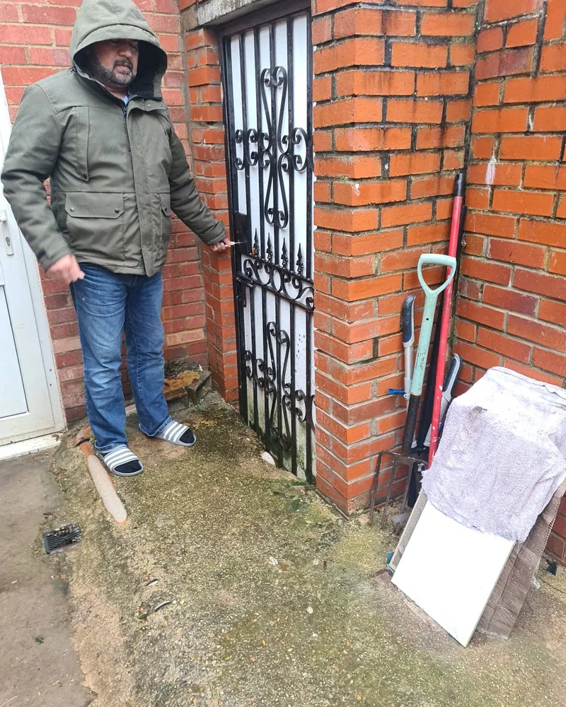 Locksmith assisting at a Westminster property entrance